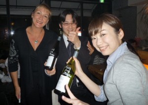 Misha signs bottles at The New Zealand Bar, Tokyo