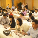 Attendees study wines at the Singapore Master Class