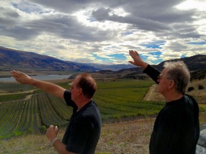 Terry Mulligan and Andy do a sun salute on the hill overlooking the vineyard (Pic - Chris So)